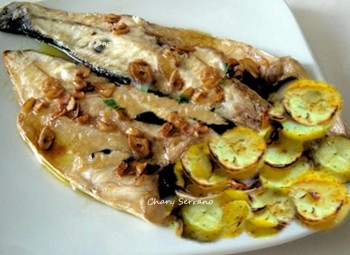 Lubina a la espalda con patatas especiadas